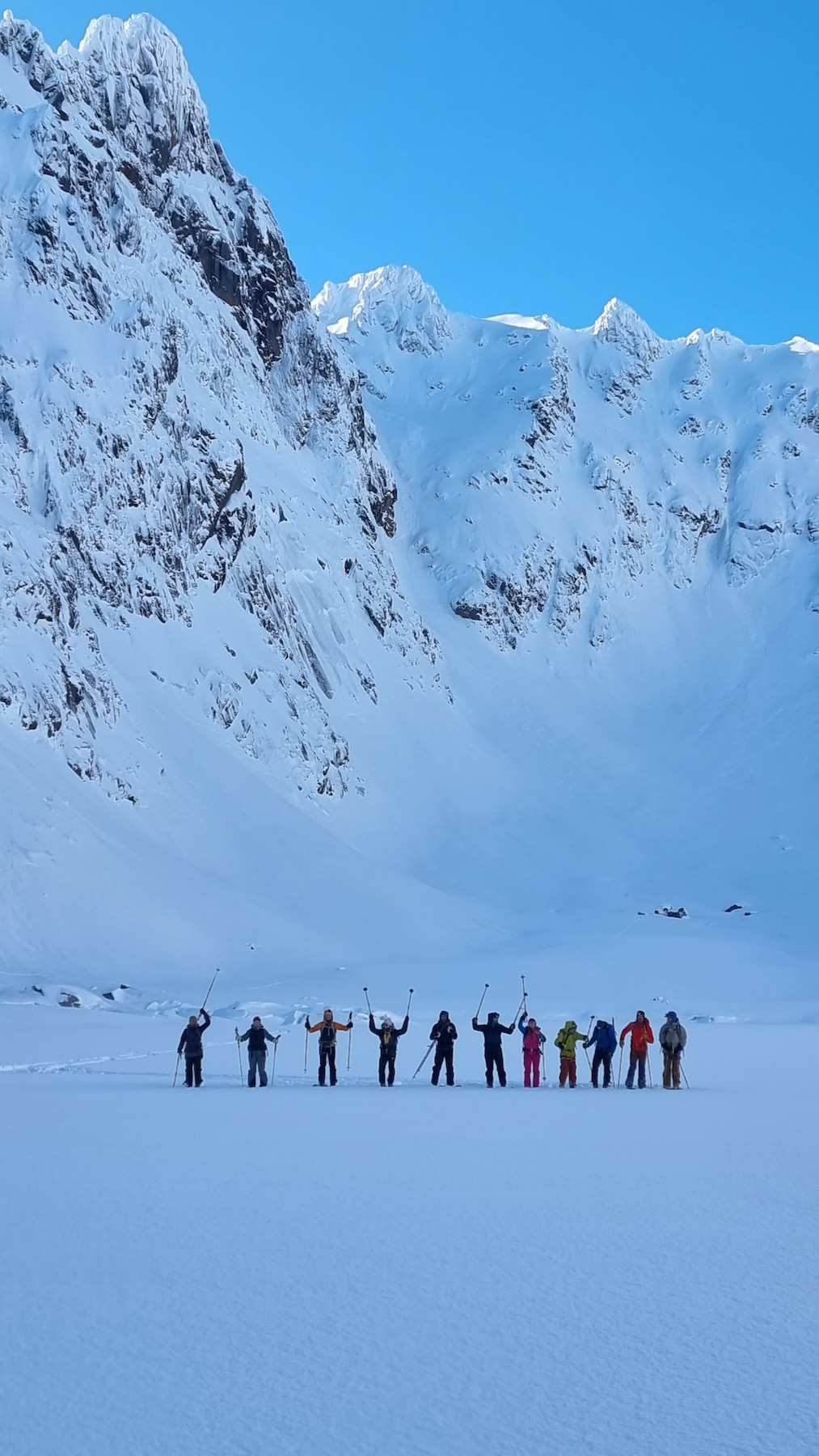Our group and the four locals we joined up with. En route to the troll fjord after descending the mountains in the background